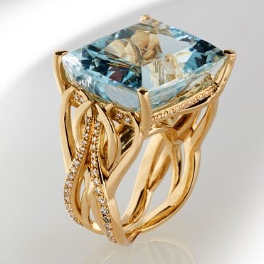 18ct diamond and blue topaz wave ring