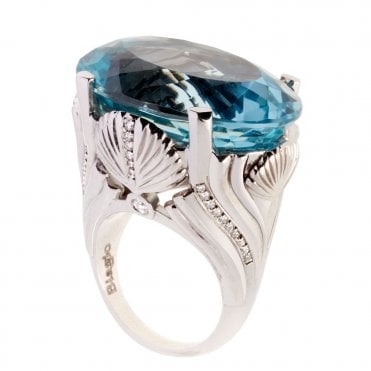 18ct white gold diamond and blue topaz ring
