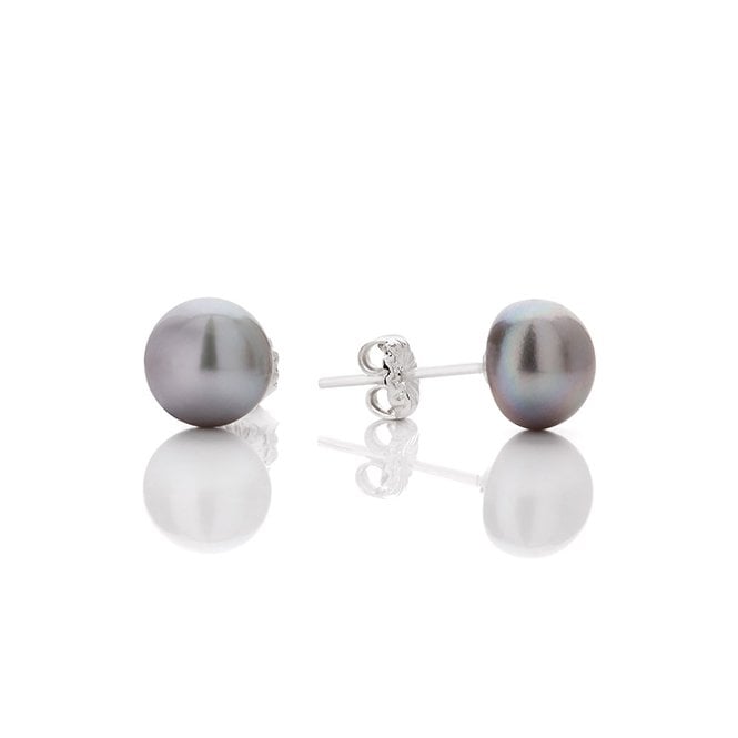 Button silver pearl studs by Claudia Bradby