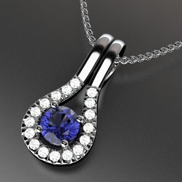 Platinum diamond and sapphire pendant