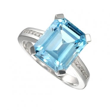 Silver and blue topaz dress ring