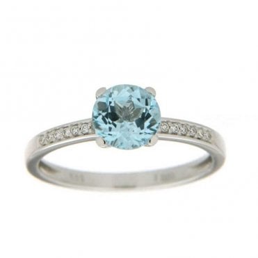 White gold diamond and topaz ring